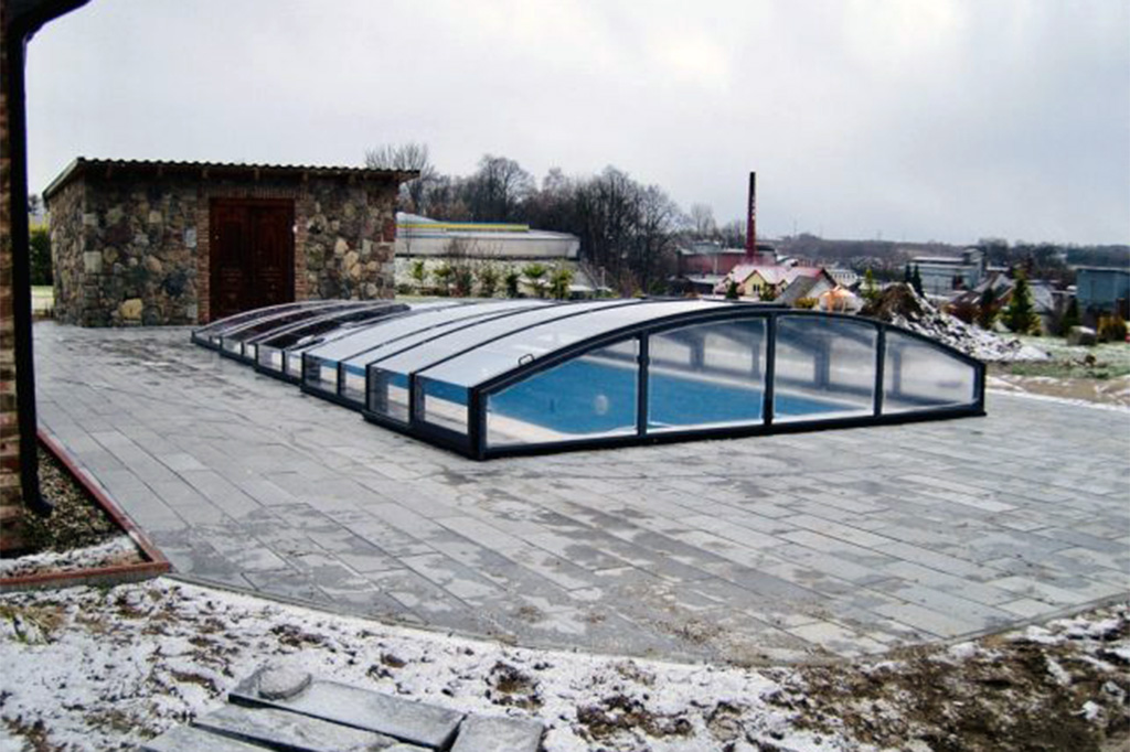 Schienenlose Schwimmbadüberdachung Aluna® Eco Schienenlose Schwimmbadüberdachung Aluna® Eco